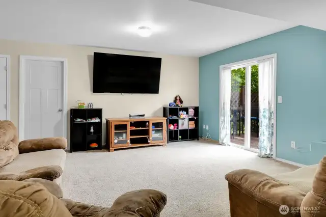 Downstairs Family Room with Guest Bedroom No. 3 (No Photo-Seller is using the Room for Storage)