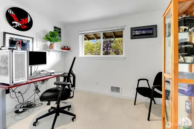 Versatile room perfect for a home office, hobby space, or additional bedroom.