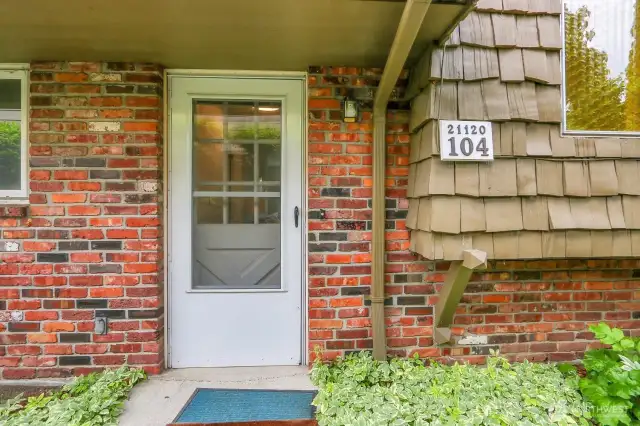 Front door entrance, access to private driveway is to the right.