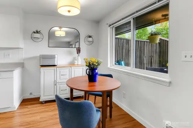 Charming dining nook just off the kitchen, with views of the garden creating the perfect backdrop for everyday dining.