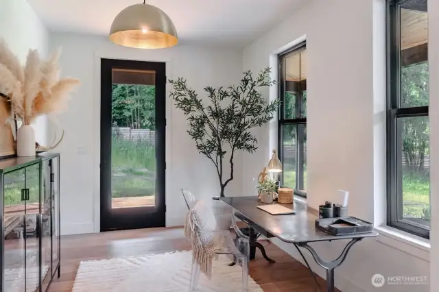 Main floor office/flex space with porch entrance