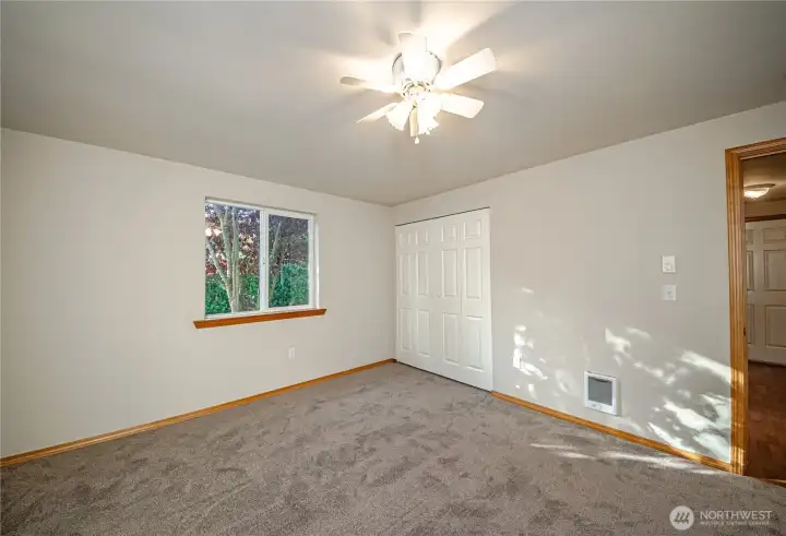 Ceiling fan in bedroom for added circulation