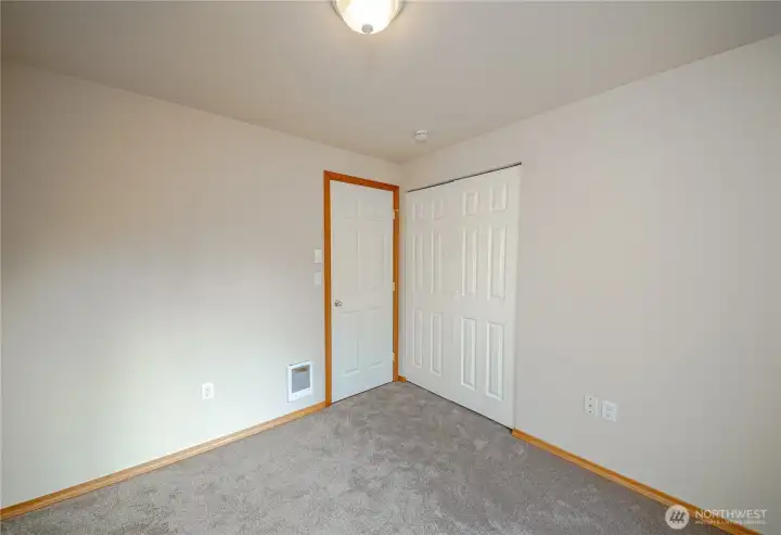Closet located behind second bedroom interior door