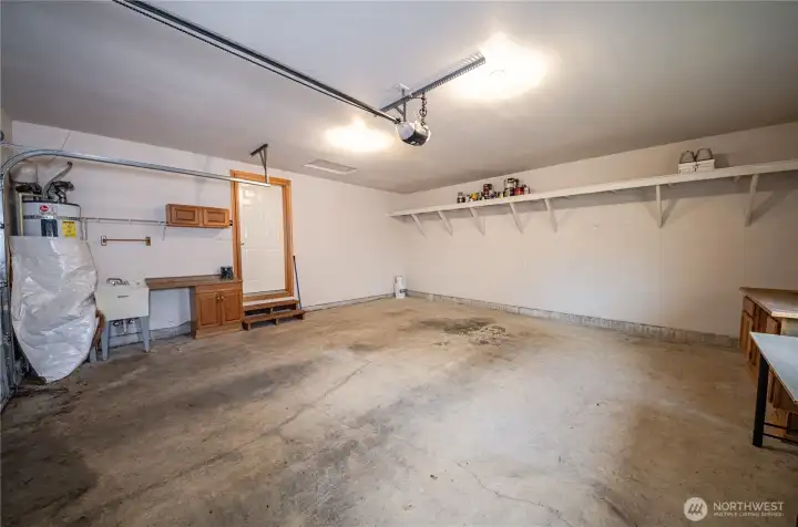 Shelving towards back of garage provides for extra storage