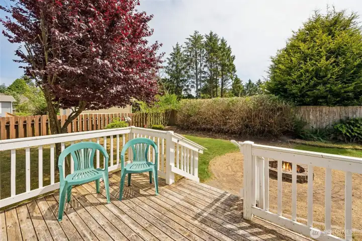 Back Deck leading into fenced backyard
