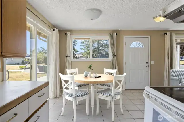 VIRTUALLY staged Dining area off the kitchen