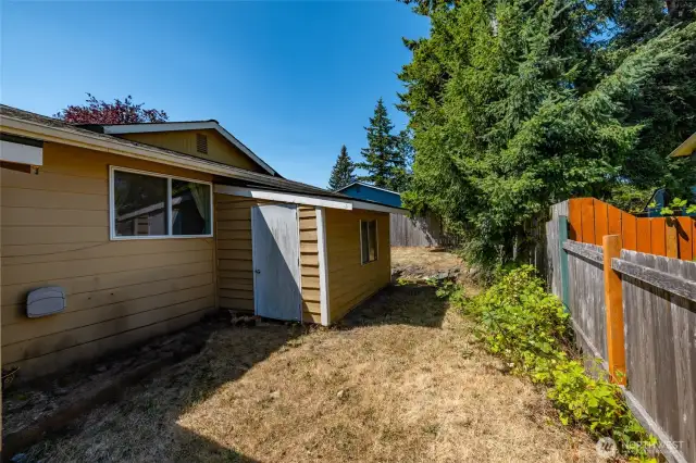 Back yard area. 2 storage sheds in the back