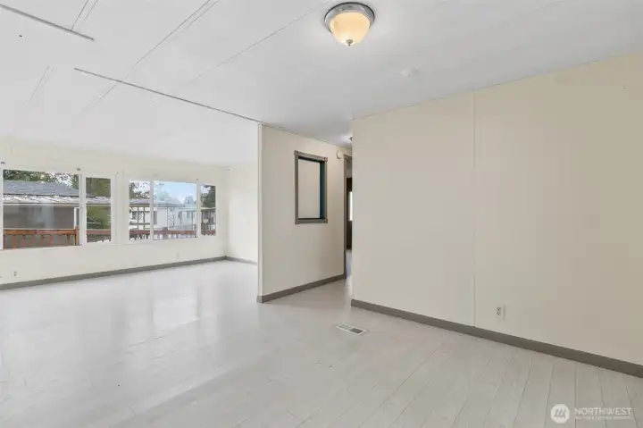 Your looking from the kitchen into the dinning area and living room.