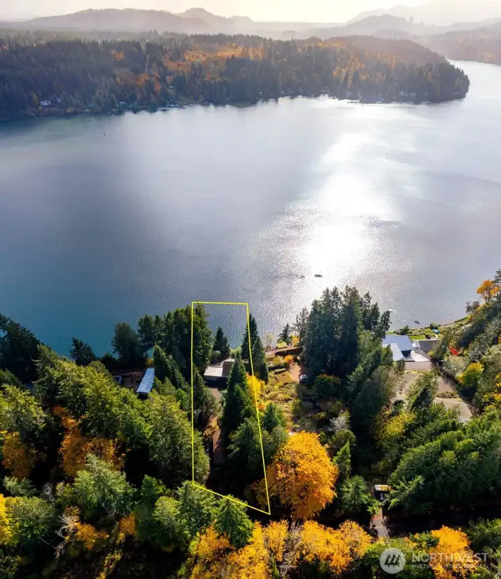 Unwrap the gift of natural beauty, comfort and joy found in this Eld Inlet remodeled NW Contemporary waterfront home with accessible beach on a private 1+ acre lot.