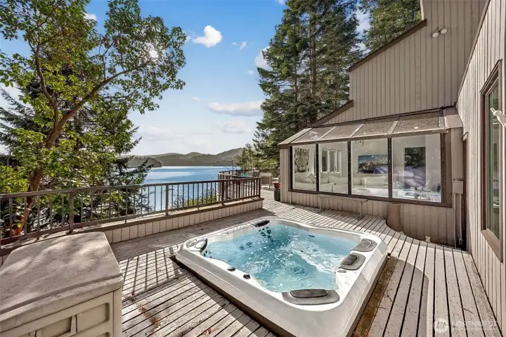 Fraom the atrium windows the new hot tub can be viewed, and accessed through the family room doors, or the garage/breezeway leading to the utility room entrance.  Enoy the views or the stars no matter the weather.