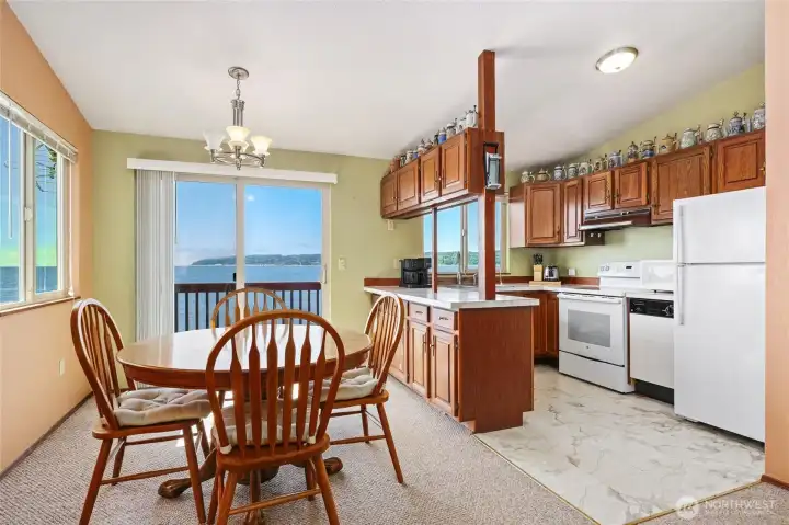 Large slider leading out to brand new deck for incredible Southerly views of the Puget Sound, Mt Rainier & the Olympic Mountains.