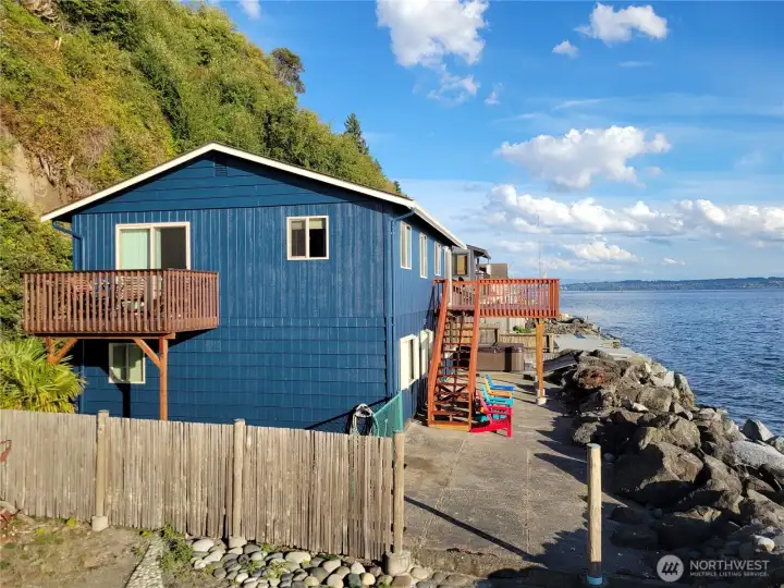 Incredible views, fenced yard, brand new deck & freshly painted exterior.
