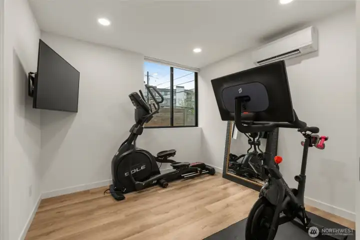 Bedroom on entry level, currently being used as a workout room