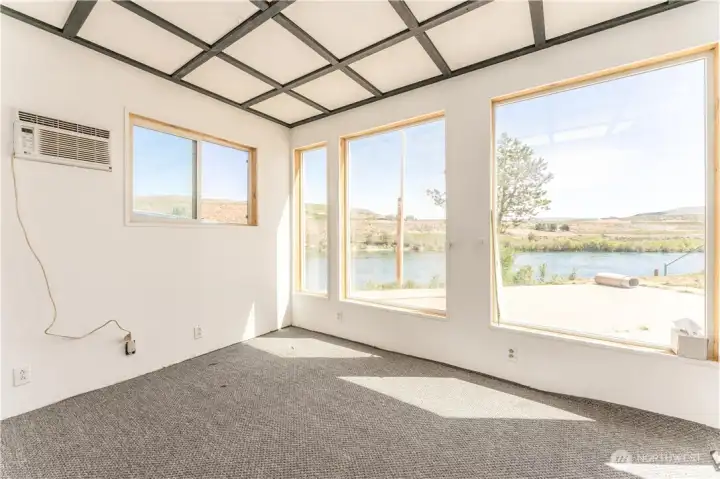 Sun room faces north also overlooking the Columbia River.