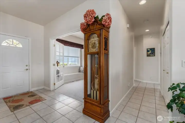 View of front door, office and hallway leading to bedrooms