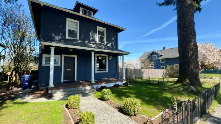 Charming curb appeal welcomes you home with timeless character and inviting presence.