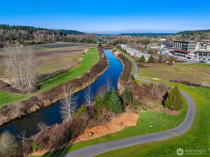 The Sammamish River winds through Woodinville, connecting wineries, parks, and scenic trails.