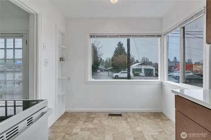 Eat-in kitchen area- could be great for a built in banquette