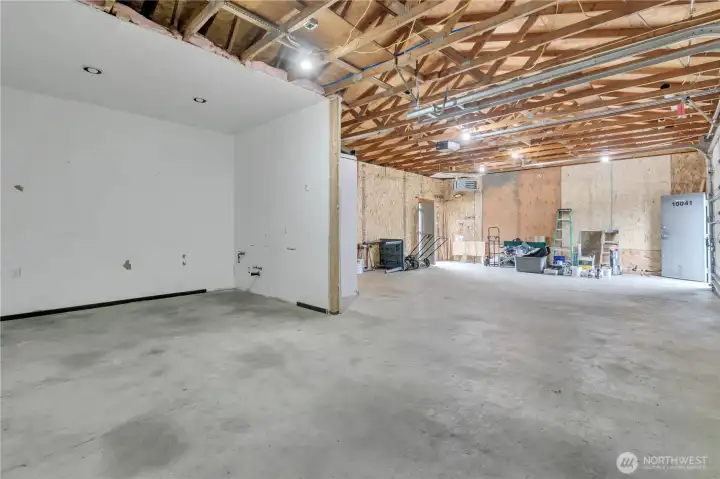 Expansive 1050 sq ft garage that could be used as a shop or for commercial operations.