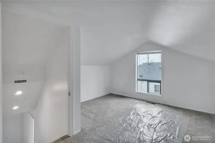 Another view of upstairs bedroom and window for daylight.