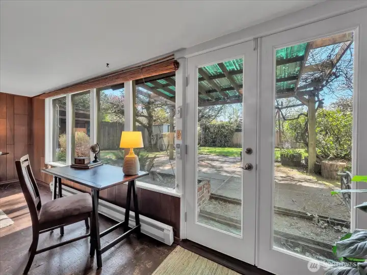 French doors leading to the covered patio and large backyard.