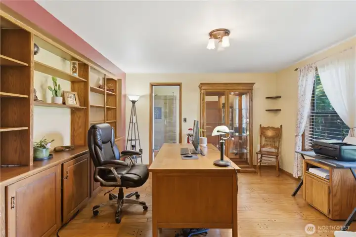 Another view of the main floor den.  Recently updated 3/4 bath is ensuite.