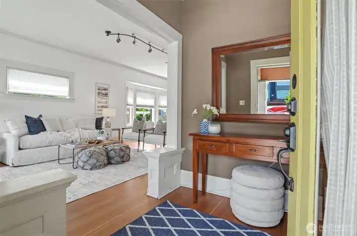 Enter into your main living area featuring plenty of space for hosting, entertaining, or relaxing.