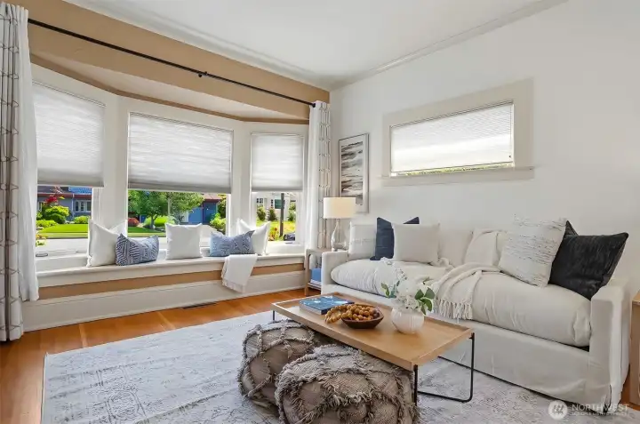 Beautiful bay windows provide extra seating and plenty of natural light.