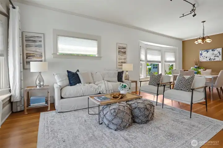 Living room flows seamlessly into dining area.