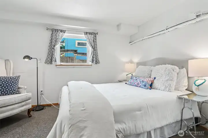 Two additional bedrooms connected to lower living room.