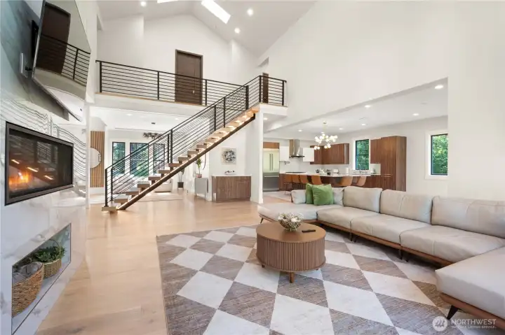 Great room with gas fireplace 24 foot vaulted ceilings