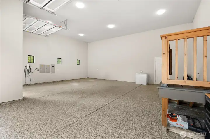 garage with epoxy floor and electrical charger