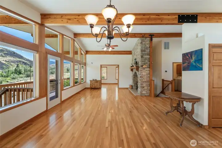 wide open dining and living with private primary suite- and covered front deck wide open dining and living with private primary suite- and covered front deck