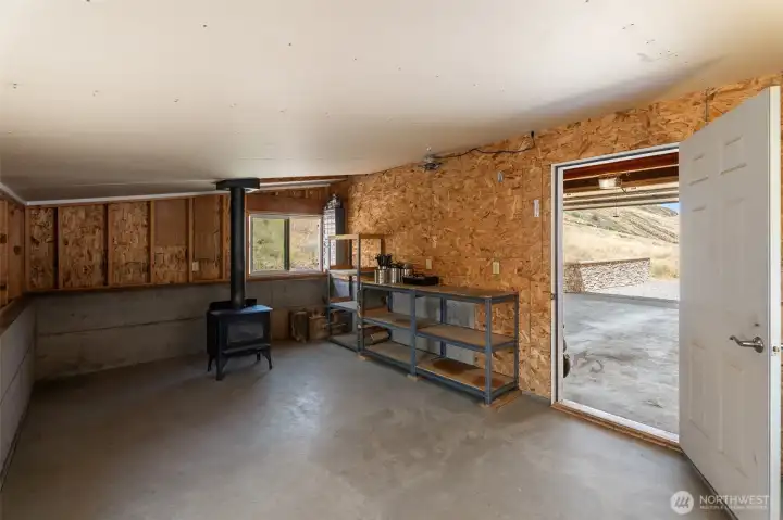 bonus room in back of garage with wood stove bonus room in back of garage with wood stove