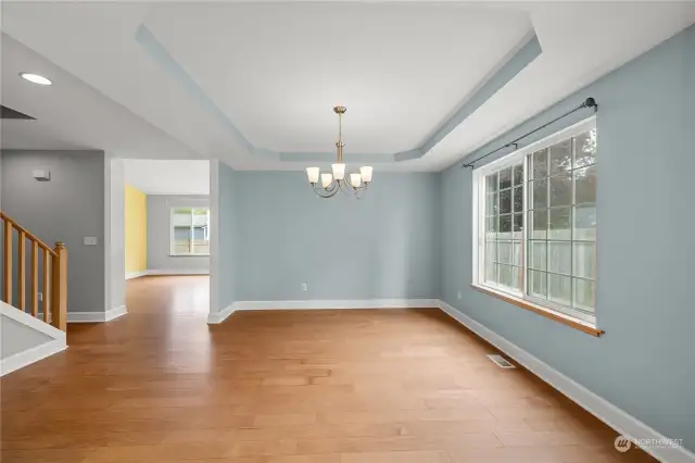 Beautiful and spacious dining room. Around corner is family room off of the kitchen.