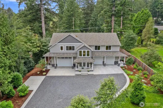 Builders Own Multigenerational Home. This home is perfectly designed for multigenerational living or extended households, offering TWO fully separate living spaces. Each side boasts its own spacious Kitchen w/oversized islands, ideal for both everyday living & hosting.