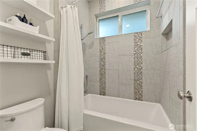 Full Bath with Designer Tile.
