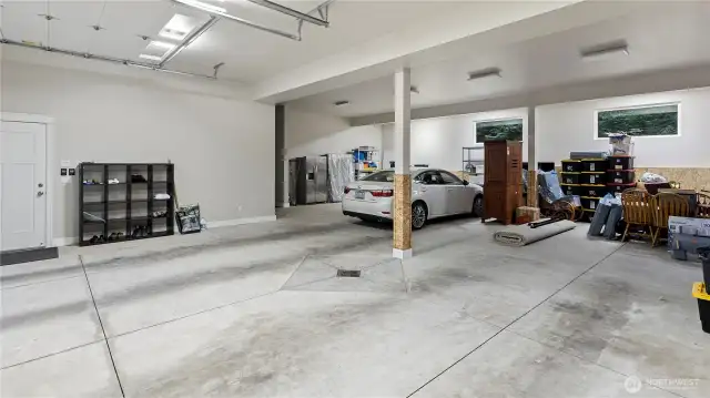This is just one side of the garages. Also a HALF Bath not shown. Other side has the Built in Storage and room for Covered RV, Boat, Trailer or more Cars!! Or Just a HUGE SHOP!!