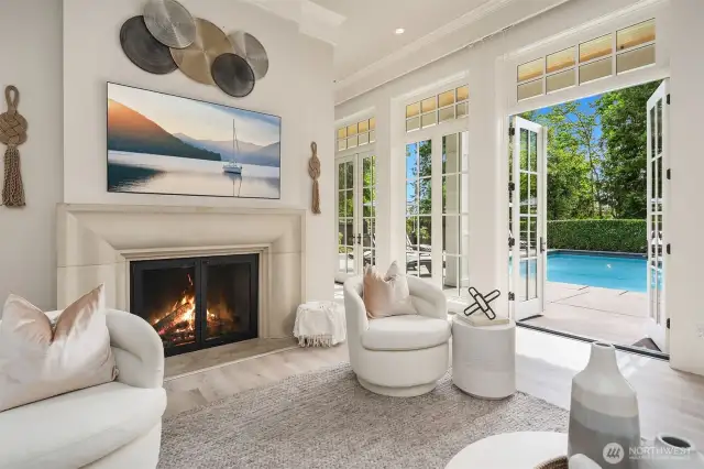Three sets of french doors allow for easy indoor/outdoor entertaining.