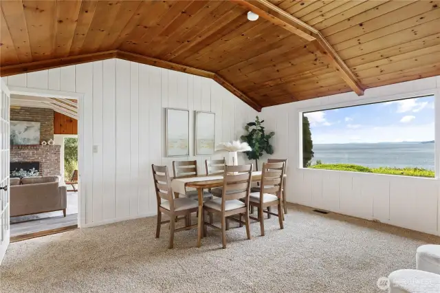 Dine with a view—this cheerful space offers unforgettable outlooks over the water and gardens.