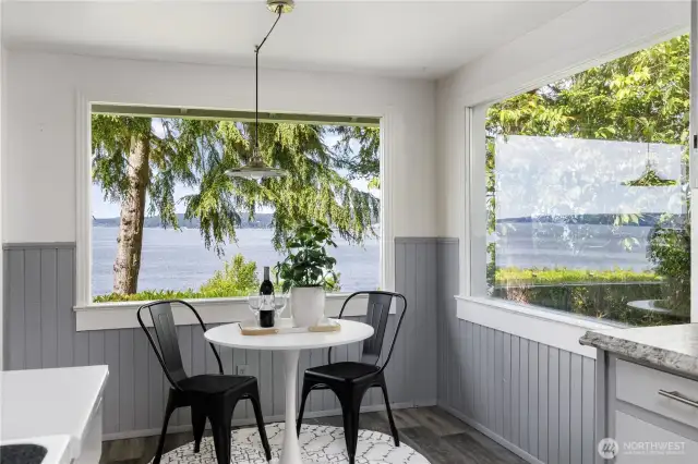 Cozy breakfast nook with sweeping water views—your daily dose of serenity and inspiration.