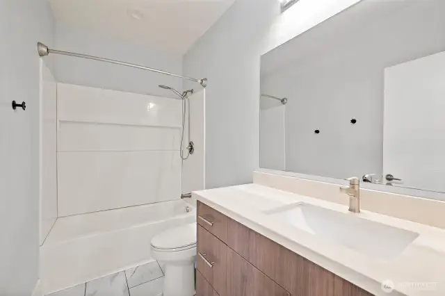 En-suite bathroom with heated floors.