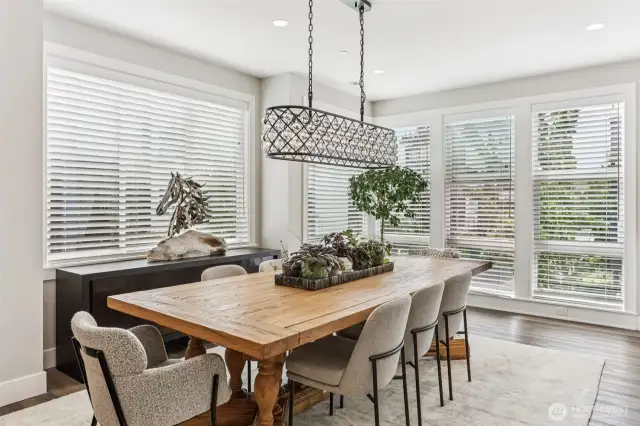 Large eating space off gourmet kitchen.  This table & chair set can stay along with most of the furniture.