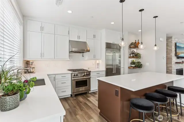 Gourmet kitchen features a Wolff Range, Miele dishwasher and Sub-Zero refrigerator.