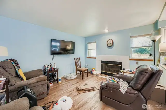 Living area with wood burning fireplace (never been used)