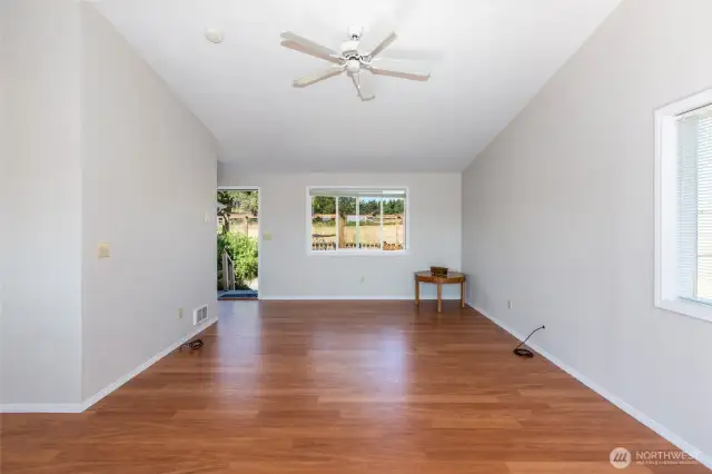Entry and living room, with vaulted ceilings.