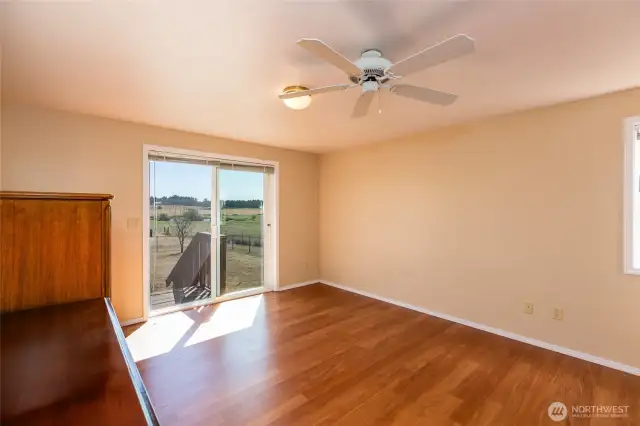 Primary bedroom with slider door.