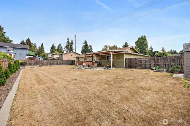 Concrete lawn edging, mowing strips around the permieter of the yard.