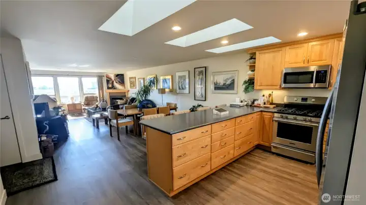 Kitchen, dining and living area in this open concept condo.