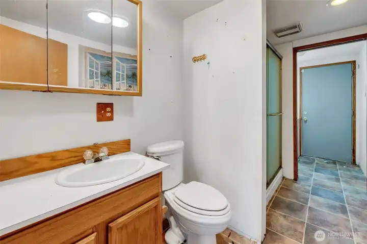 Bathroom with laundry room
